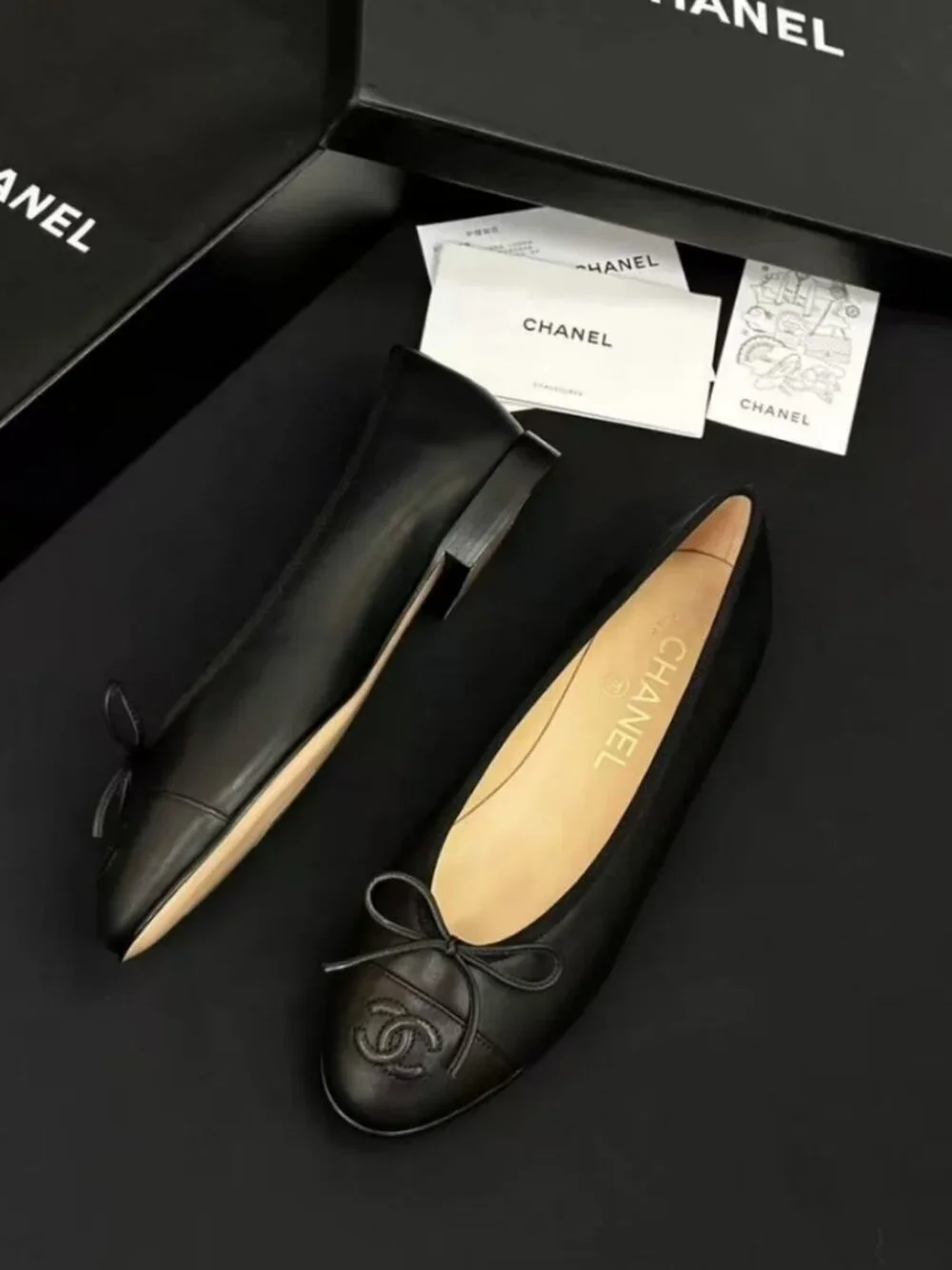 CHANEL All-Black Leather Bow Embossed CC Ballerina Flat Shoes